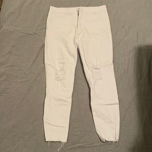 White high-waisted, knee distressed jeans! Size M